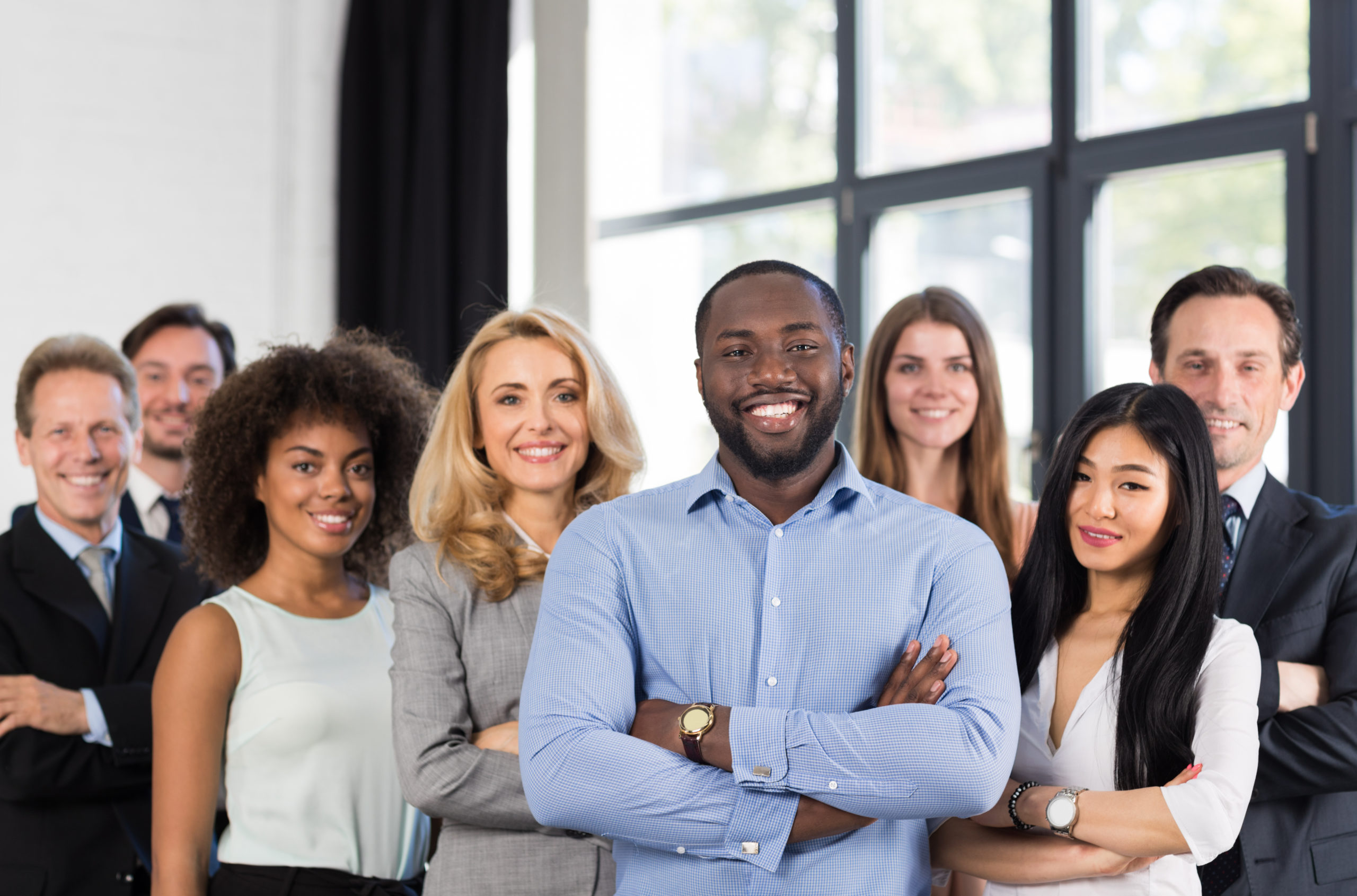 African American Businessman Boss With Group Of Business People In Creative Office, Successful Mix Race Man Leading Businesspeople Team Stand Folded Hands, Professional Staff African American Businessman Boss With Group Of Business People In Creative Office, Successful Mix Race Man Leading Businesspeople Team Stand Folded Hands, Professional Staff Happy Smiling